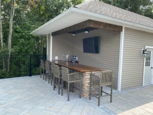 Outdoor Bar showing a custom American Walnut Bar Top by Hardwoods Incorporated