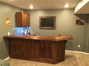 Beautiful solid walnut home bar and Traditional wood bar arm rest molding.