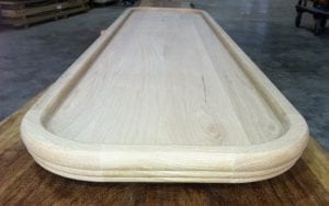 Island Home Bar Top featuring our radius bar rail corners BR158