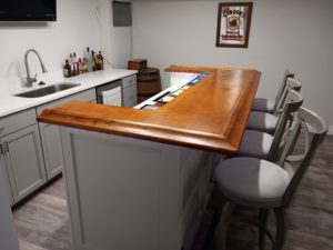 Nice U shaped home bar with our BR475 Oak Chicago Bar Rail Molding