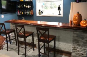 Nice Home Bar With Walnut Bar Rail.