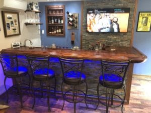 Solid oak home bar top with our BR475-S original Chicago Bar Rail Moldings