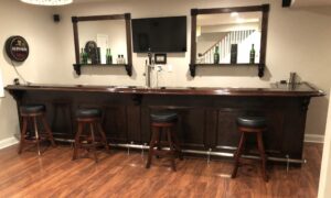 16' Long Home Bar With our BR550 Oak Chicago Bar Rail.
