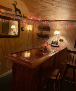 Bar area built with the BR450 Maple Home Bar Rail Molding by Hardwoods Incorporated.